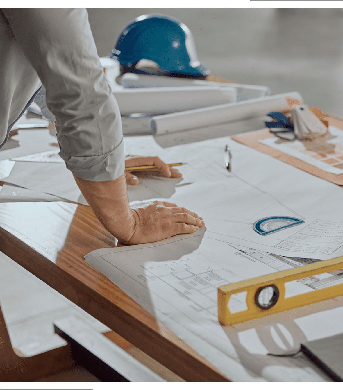 Drafting table with tools and helmet