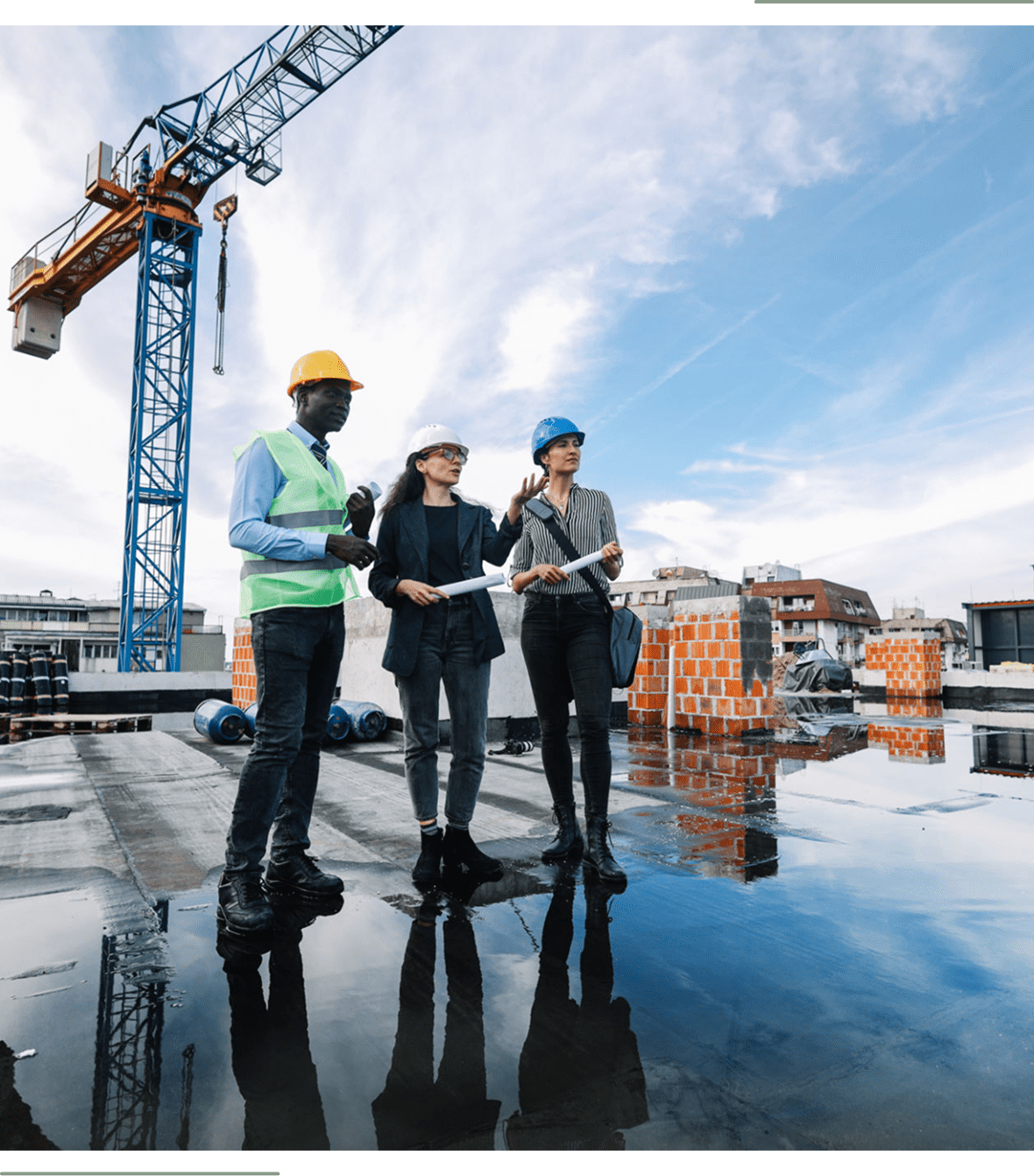 Architects discussing project on rooftop
